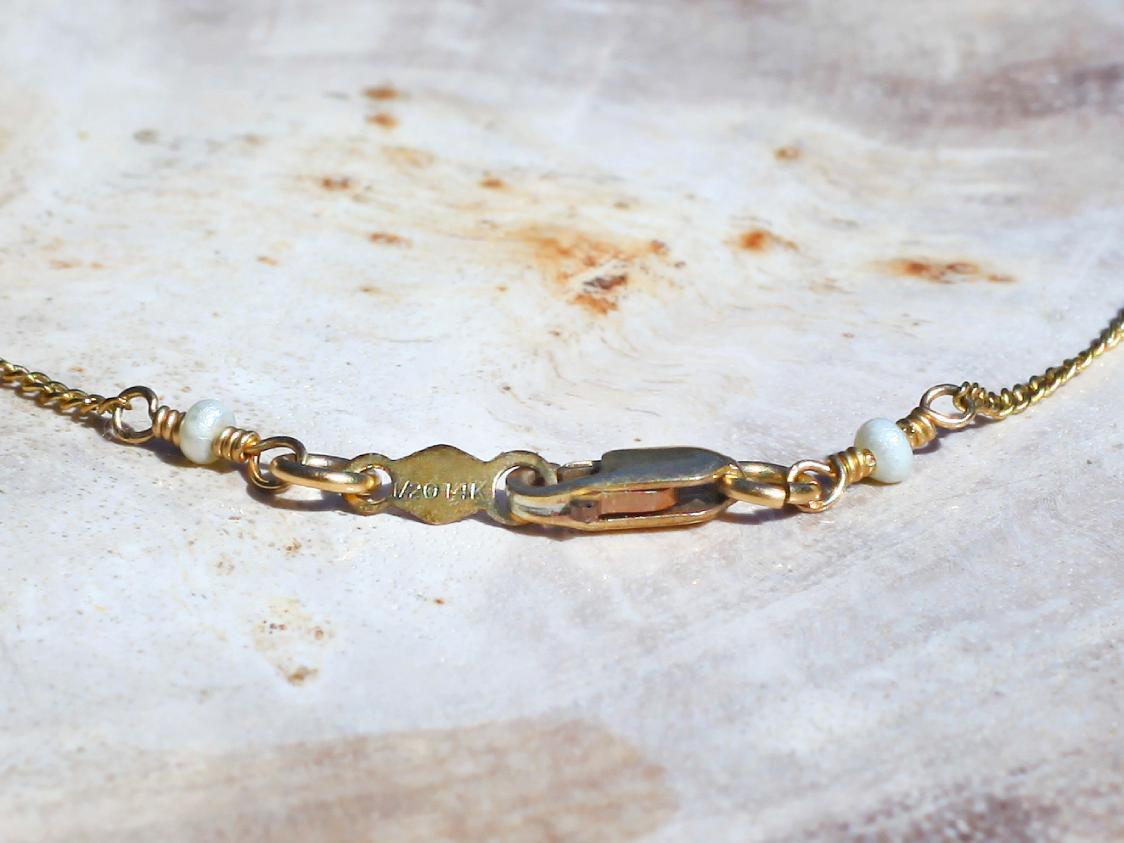 Dana Kellin Jewelry | Crystal + Pearl Bow Pendant Necklace | Firecracker